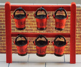 6 fire buckets on free-standing rack